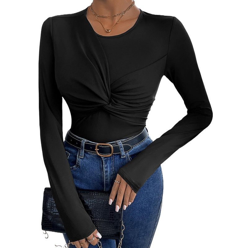 Solid black body with a twist collar and minimalist style.