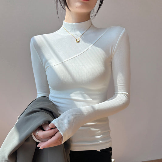 High-elasticity cotton base layer with a mock-neck collar.